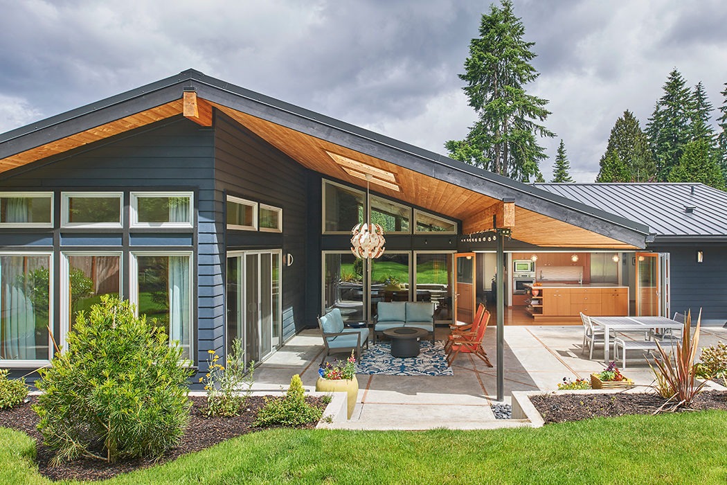 kirkland seattle Mid Century remodel covered patio with vaulted ceiling, exposed beams, and folding doors