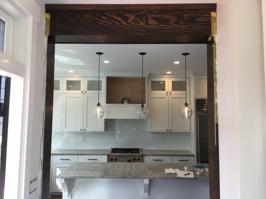 finishing touches on a remodeled kitchen in a queen anne classic craftsman