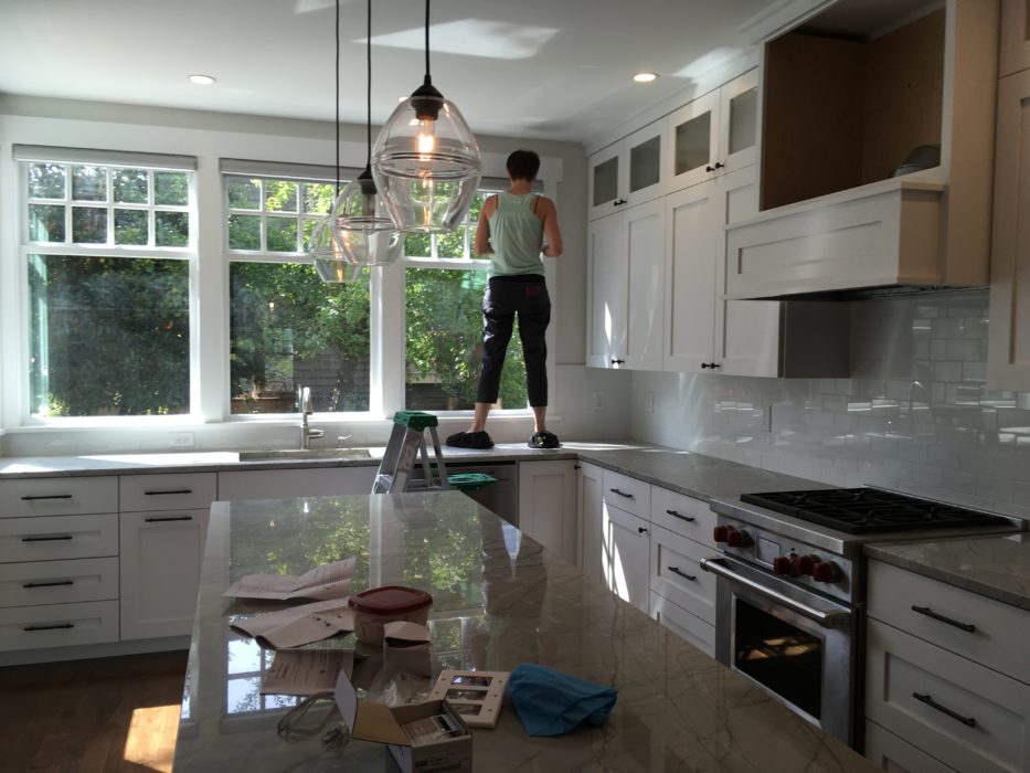 putting the final touches on a remodeled kitchen