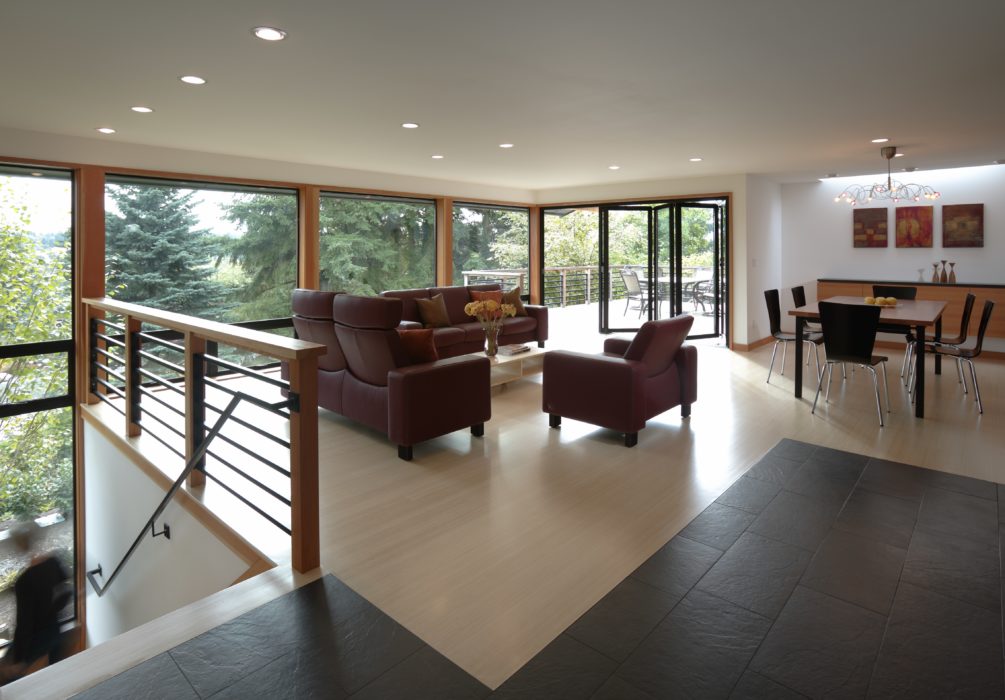 living space and stairwell with views to outside